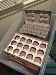 I like to use the boxes that my ornaments came in to store them safely. Egg cartons work great, too!